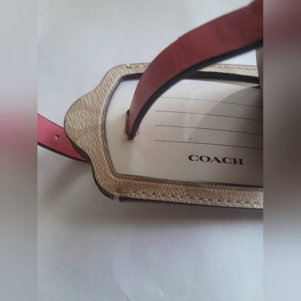 New Coach Luggage Tag In Sing.Pink/Tan/Brown Color New With Tags